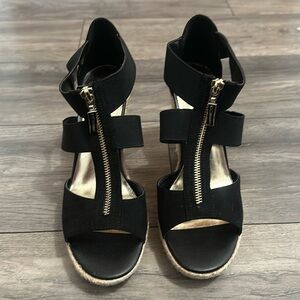 Brand new, Guess black wedges.